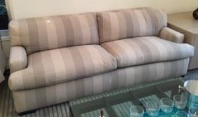 One of the three person sofas in this sale....