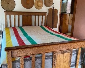 HUDSON BAY BLANKETS ON A RANCH STYLE QUEEN FRAMED BED