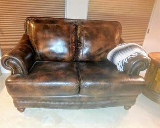 Leather love seat