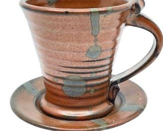 Lot 133
Sandy Miller Pottery - Cup and Saucer in Copper Glaze