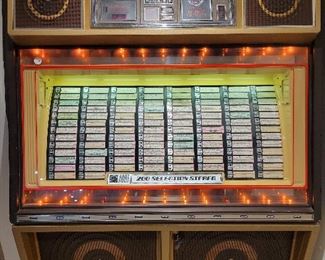 Jukebox loaded with 45s. Delivery available in Los Angeles. Fully serviced and working