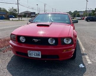 2008 Red Mustang GT.  Starting bid: $10,500