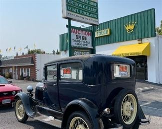1929 Blue Ford Model A with Soft Top.  Starting Bid: $15,500.00