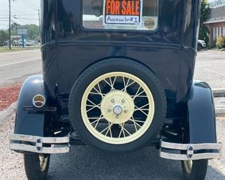 1929 Blue Ford Model A with Soft Top.  Starting Bid: $15,500.00