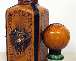 
Leather Covered Green Glass Decanter With Metal High Relief Lion Head