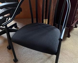 Black side chair on castors