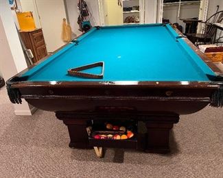 Brunswick pool table - includes billiard balls, cues and holder!