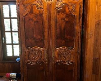 Large carved wood wardrobe cabinet.....