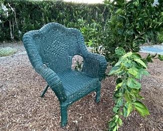 Wicker chair in hunter green