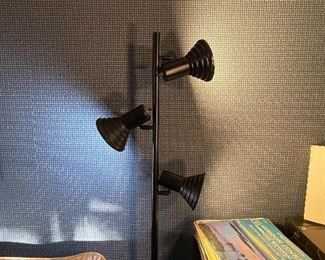 1980 Pair black metal floor lamps 