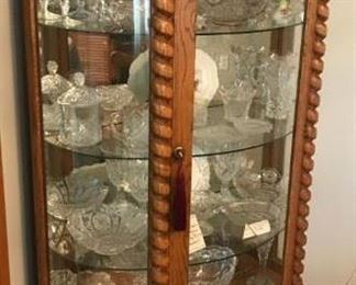 Lovely Amish Curved Glass Curio Cabinet with Spindle detail - Featuring 3 glass shelves, interior lighting and mirrored top 