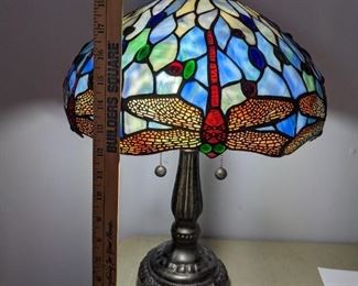 Leaded glass lamp with metal base and dragon flies