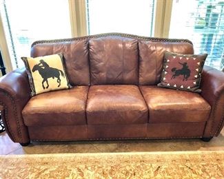 Nailhead trim leather sofa