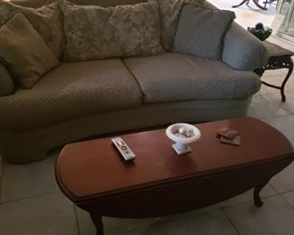 second sofa and a cherry colored coffee table