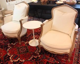 Tulip table upholstered armchairs