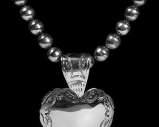 Hand-chased silver necklace