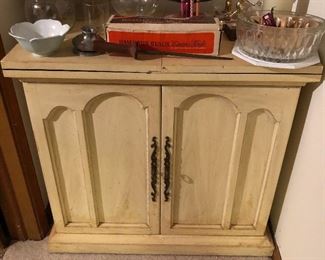 Compact credenza with fold-out top.