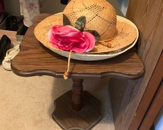 Women’s hats: accent table.