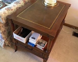 One of a pair of matching single-drawer accent/side tables.