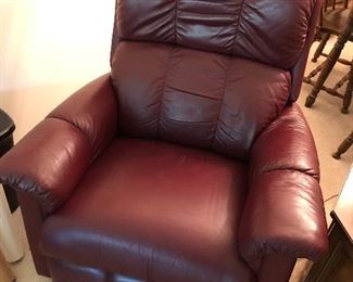 Maroon reclining chair.