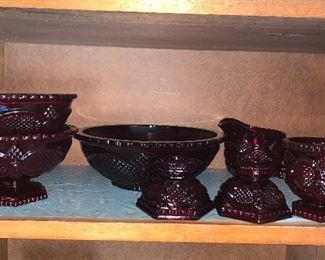 Ruby cape Cod by Avon 
footed Bowls $15 or
Bowl $12.50
Candle holders $8
Sugar and Creamer $10