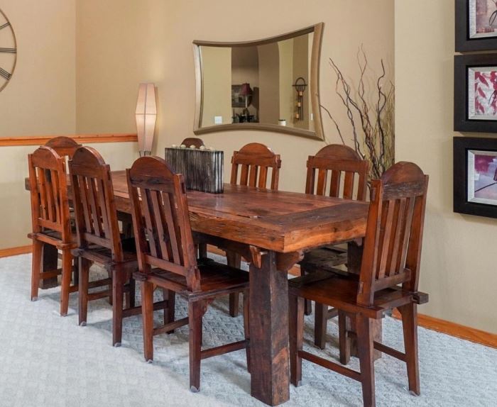This table is made of teakwood. The top of the table is made from a castle door. THIS TABLE AND CHAIRS IS STURDY, HEAVY, WELL BUILT, AND JUST GORGEOUS!!