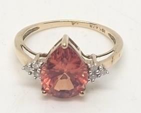 123 - 10K Gold sapphire & diamond ring marked AJR Believe it to be Padparadsha sapphire Diamonds tested Yellow gold size 6 3/4
