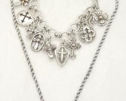 127 - Brighton charm bracelet with crosses & necklace 16" rope necklace with two tone cross pendant 8" bracelet with 13 crosses
