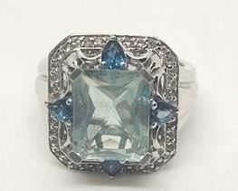131 - Sterling blue topaz ring size 6 1/2
