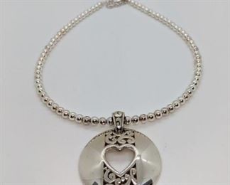 246 - Circle Scroll Pendant beaded Necklace signed "H" 18" long necklace 1 1/1" round pendant
