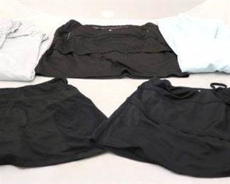 292 - Women's Sports Wear 3 - Skorts, size smalls 2 - Overshirts 1 - pair of bell bottomed leggings
