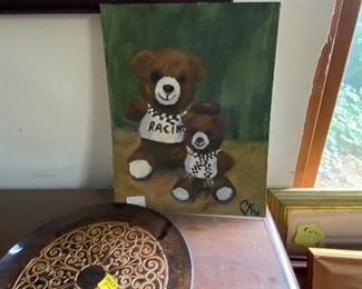 Wooden artwork
And round bar laying down.