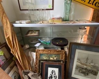 Miscellaneous glassware on display glass case