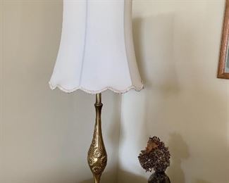 Tall heavy Brass Lamp with floral detail. Pretty