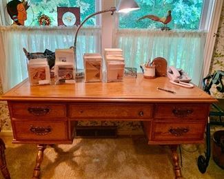 53" wide x 25" deep. Beautiful vintage desk by Cushman Colonial 