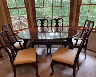 Kincaid cherry table, 6 chairs, 2
Leaves and table pad/cover.
