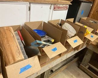 Priced Boxes in the shop with various items in each.  Do NOT change items from one box to the next....