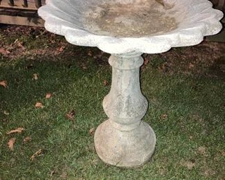 Two concrete bird baths