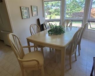 Light wood Dining Table with 4 chairs and 2 arm chairs