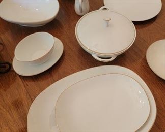Noritake White with a gold Trim , 12 place setting  