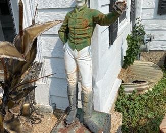 Vintage cast iron lawn jockey hitching post