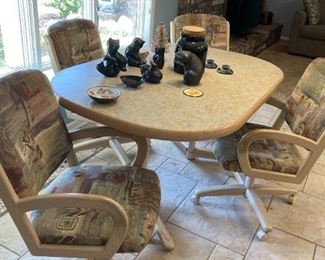 Kitchen table with 4 chairs (rolling and swivel)