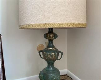 there are a pair of these MCM brass Oriental table lamps.