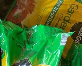 Unopened bags of soil