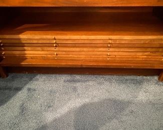 DINING TABLE THAT COMES APART AND FITS INTO A CABINET. 