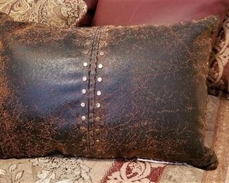 Leather pillows for sale too.