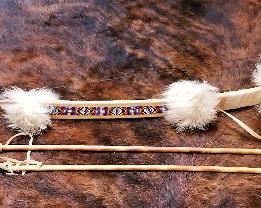 Native American beaded bow and arrows