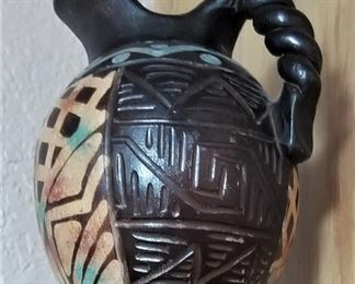 Black and turquoise pitcher