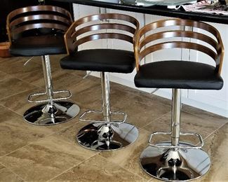 4 mid-century modern bar stools that swivel