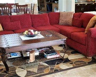 Red sectional sofa and coffee table